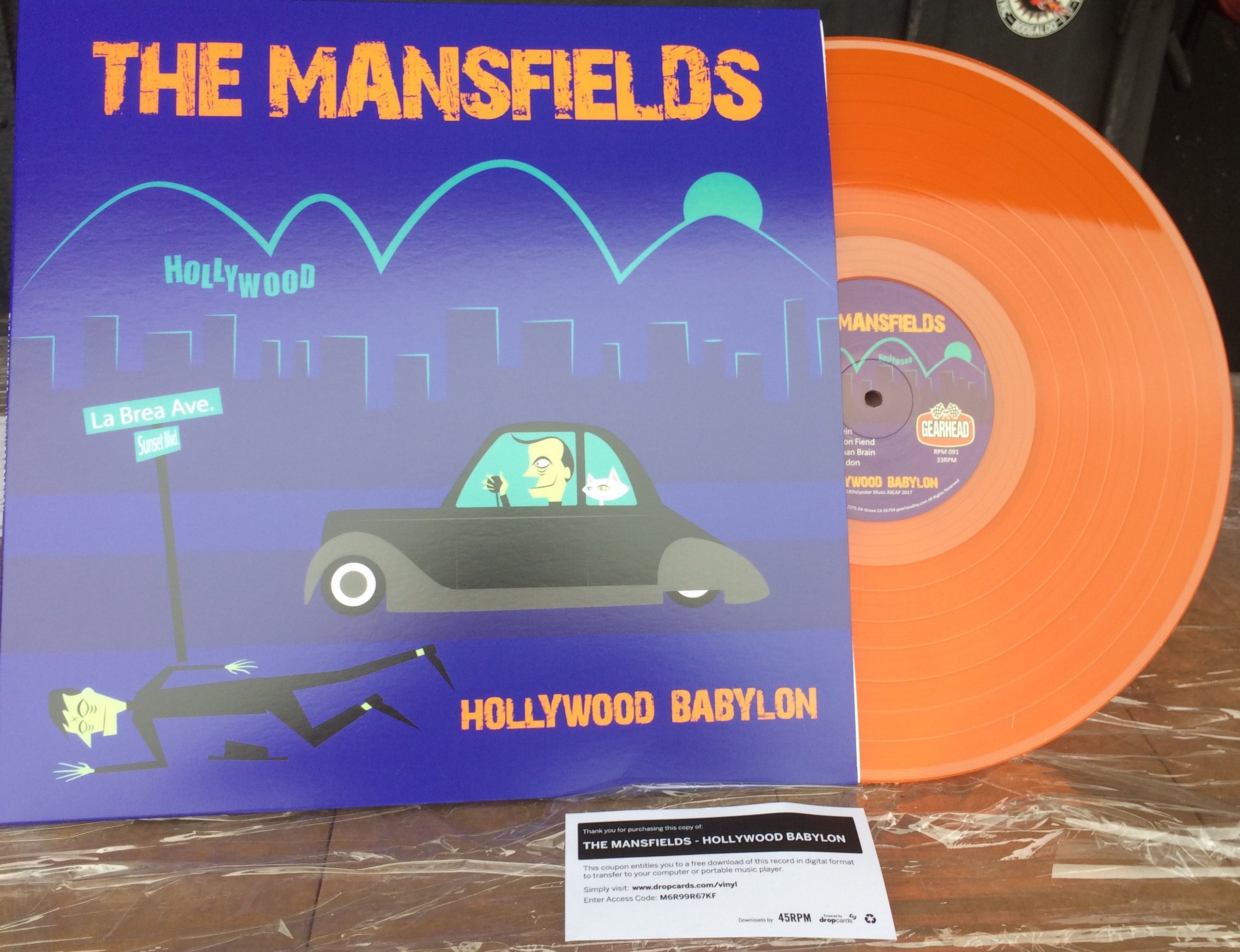 Glam-punk psychobilly The Mansfields hits you in the with a ltd. ed colored slab o' wax